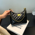 Classic black quilted shoulder bag with gold twist lock and metal chain strap detail - Black