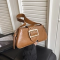 Caramel brown pebbled leather underarm bag with large golden square buckle and eyelets - Brown