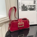 Vintage glossy red underarm bag with large gold square buckle and wide shoulder strap - Red