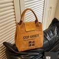 Brown Dupont paper tote bag with Stop Anxiety print and vintage crinkled texture - Khaki