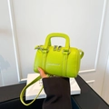 Neon green litchi grain mini Boston bag with silver hardware and fashion logo - Green