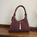 Leopard print bucket bag in burgundy leather with silver metal lock and handle - Burgundy