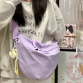 Fashionable purple nylon crescent crossbody bag for women with cute yellow chick charm - Purple With Pendant