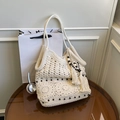 Beige hollow crochet tote bag with black wooden beads and tassel hanging decoration - Off-white