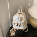 Minimalist cream white mini backpack in synthetic leather with cute plush monster charm - White with Pendant