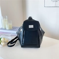 Minimalist black backpack in matte faux leather with silver metal plaque and side zippers - Black