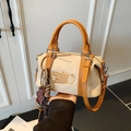 Creamy white boston bag with tan leather trim and cute gingerbread man embroidery - With Charm / Matte White