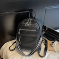 Black pebbled leather backpack with decorative geometric pattern wide strap and silver zippers - Black
