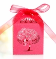 Detail of red laser-cut candy box with hollow tree design and organza ribbon - Pearlescent Red