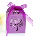 Close-up of purple laser-cut gift box featuring a tree of life design and matching ribbon - Dark Purple