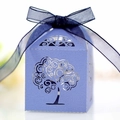 Detailed laser-cut tree design on a purple gift box with a blue organza ribbon bow - Sapphire Blue