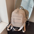 Beige faux leather backpack with litchi texture and geometric patterned wide strap - Khaki