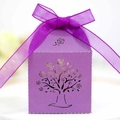 Detail of laser-cut rose tree pattern on purple paper favor box with organza ribbon bow - Dark Purple