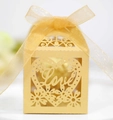 Detail of laser-cut gold wedding favor box with heart pattern and Love lettering - 5*5*8 CM / Gold