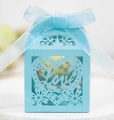 Light blue laser cut candy box featuring a hollow heart and Love design with a ribbon bow - Tiffany Blue