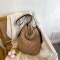 Large khaki woven straw tote bag with brown leather strap and metal buckle - Khaki