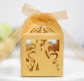 Golden laser-cut wedding favor box with romantic heart and couple silhouette design - Gold