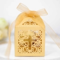 Detail of gold hollow cross candy box with laser cut floral patterns and organza ribbon - Gold