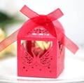 Detail of red laser-cut swan heart candy box with glossy finish and silk ribbon - Pearlescent Red