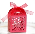 Detail of red laser-cut floral candy box with pearlescent finish and organza ribbon bow - Pearlescent Red