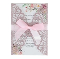 Detail of pink laser-cut invitation with glitter texture and floral card insert - Glitter Pink