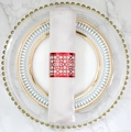 Elegant red hollow geometric napkin ring with metallic finish on white satin napkin - Reflective Bright Red