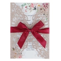 Invito matrimonio glitter oro rosa intagliato a laser con fiocco di raso rosso e fiori - Oro Mela