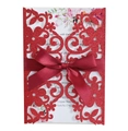 Detail of red glitter laser cut wedding invitation with ribbon and floral insert - Glitter Red