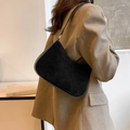 Minimalist black suede hobo shoulder bag with gold hardware for a chic commute style - Black
