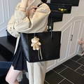 Large black woven tote bag with a cute bear pendant accessory on thin shoulder straps - With Charm / Black