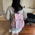 Casual lavender purple large nylon backpack for students featuring yellow embroidery - Purple