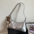 Silver metallic leather hobo bag with slim strap and brown leather 'T' pendant detail - Silver
