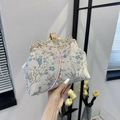 Floral jacquard evening clutch with pearl accents and gold rhinestone frame in beige - Blue