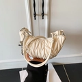 Chic off-white quilted hobo bag with signature wave pleats and silver chain detail - White with Pendant