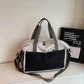 Schwarz-weiße Reisetasche mit großem Fassungsvermögen, Gurt und NINGJIA-Logo für Damen - Schwarz