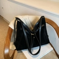 Large black hobo shoulder bag with a soft matte texture and golden metal hardware - Black