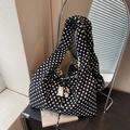 Black canvas tote bag with white polka dots and stylish strap details for daily use - Black