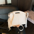 Minimalist beige leather tote bag with stylish side fringe and adjustable strap - White