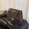 Vintage dark brown crossbody bag with matte finish and buckle detail on white background - Brown