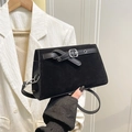 Minimalist black matte crossbody bag with silver buckle and suede panel detail - Black