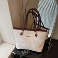 Chic cream tote bag with marble texture and brown handles for office commuting - Beige