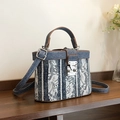 Blue denim box bag with white floral lace overlay and brown leather handle strap - Dark Blue