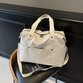 Off-white canvas sports gym bag with NINGJIA logo and adjustable shoulder strap - Off-white
