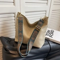 Khaki hobo shoulder bag featuring a wide bohemian style ethnic woven strap and gold buckles - Off White