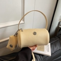 Creamy yellow lychee textured cylinder handbag with matching mini coin purse charm - Light Yellow