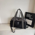 Gray and black dual-tone fitness travel bag with shoulder strap and NINGJIA logo - Black