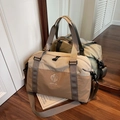 Large khaki nylon travel bag with dual shoulder straps and NINGJIA logo branding - Khaki
