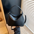 Classic black litchi grain leather handbag with top handle and silver metal hardware - Black