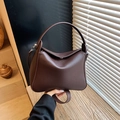 Lindy style shoulder bag in dark brown lychee leather with dual handles and silver hardware - Brown
