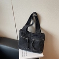 Deep grey washed denim tote bag with two front zipper pockets and wide shoulder strap - Black